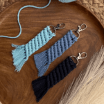 Elevate your keychain game with our Handmade Macramé Angular Keychain. Carefully crafted with precision and attention to detail, this unique accessory combines the art of macramé with a modern angular design. The intricate knots and geometric shape create a visually striking piece that adds a touch of elegance to your everyday carry. Made with high-quality materials, this keychain is built to withstand daily use while keeping your keys securely in place. Whether you attach it to your keys, backpack, or purse, the Handmade Macramé Angular Keychain is a stylish and functional accessory that reflects your unique sense of style. Make a statement and show off your love for handmade craftsmanship with this one-of-a-kind keychain.