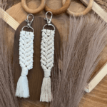 Add a whimsical touch to your keys with our Handmade Macramé Mermaid Tail Keychain. Crafted with care and attention to detail, this unique accessory showcases the artistry of macramé knots. The intricate design of the mermaid tail brings a sense of enchantment and fantasy to your everyday carry. Made with quality materials, this keychain is durable and built to last. Whether you use it to accessorize your keys, bags, or backpacks, the Handmade Macramé Mermaid Tail Keychain is sure to make a statement and capture the hearts of mermaid lovers everywhere. Dive into the magic of this charming keychain and let it accompany you on your daily adventures.